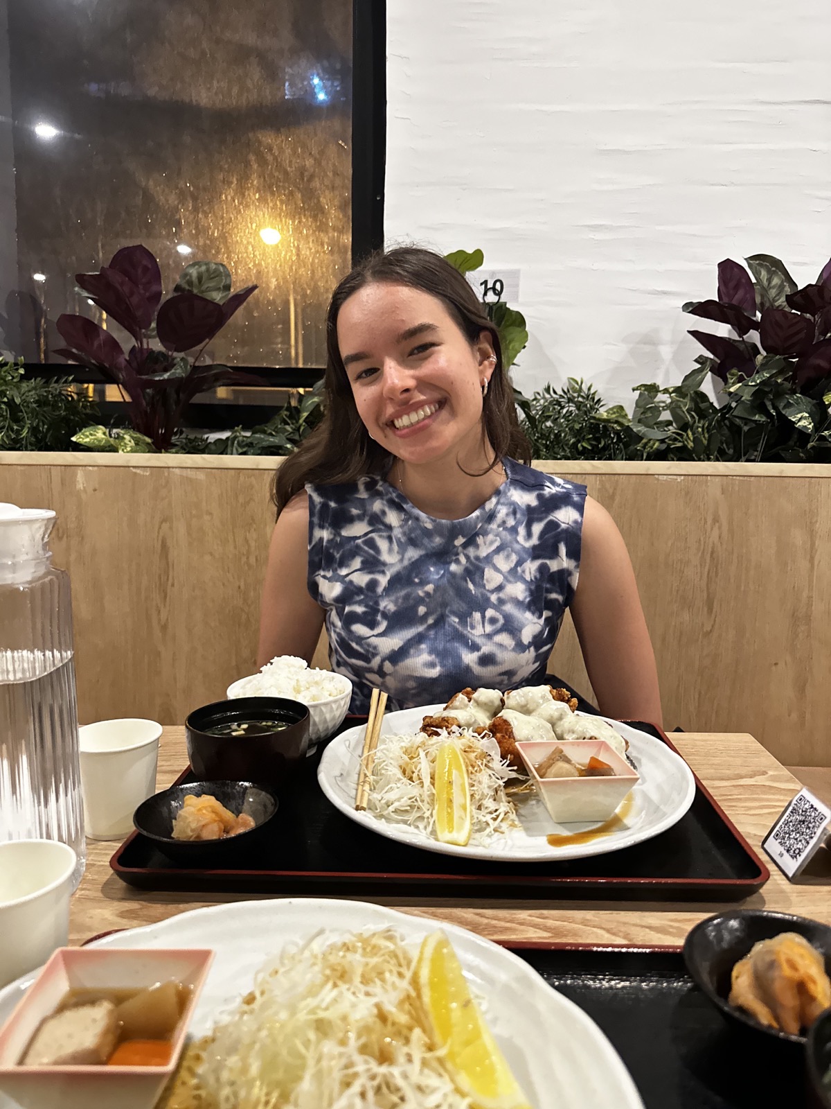 Ioana smiling during dinner at Koto Sanpo