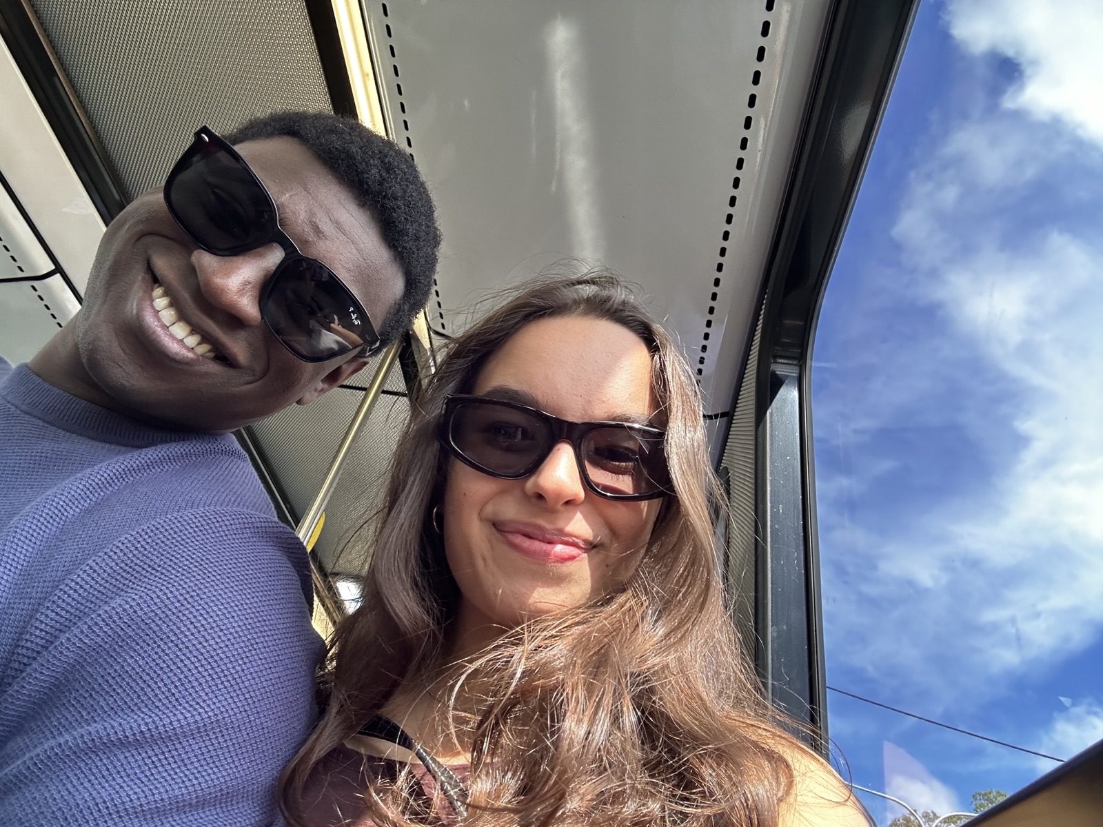 Ioana and her partner taking a bus ride together